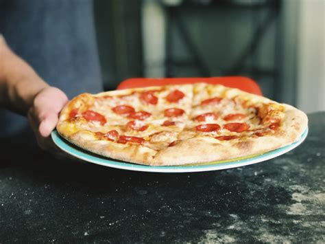 Lola pizza. Small Pizza – $9 . Large Pizza – $12 (All pizza bases come w/ shredded mozzarella cheese) GET SAUCY Tomato Sauce. Basil . Pesto . Garlic Oil. 2. 3. SAY CHEESE. 