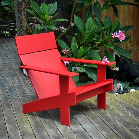Lollygagger - When you're settling back in the Lollygagger Outdoor Lounge Chair this modern end table is a splendid companion to hold your favorite beverage or a book when you need to close your eyes for a minute. The lower shelf is a nice spot to keep things free from morning dew or a light rain. Plus, it’s made from recycled plastic, which …