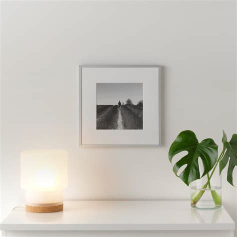LOMVIKEN series. Create a clean look for your artwork with LOMVIKEN grey picture frames in lightweight aluminium – a unique shape on the back makes them look like they’re placed at a distance from the wall. And the understated design and slim contour doesn’t steal the show from your beautiful piece of art. 26 items. Product.. 