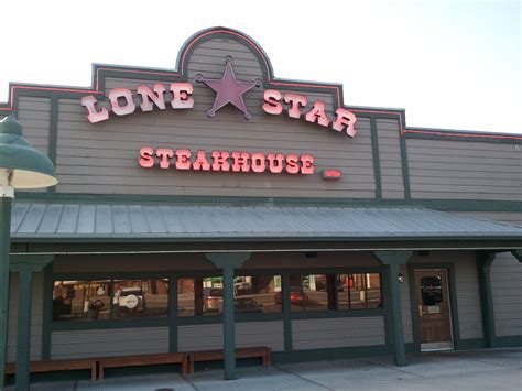 Lone star steakhouse & saloon menu. Gourmet Burgers and Sandwiches. Served with Lettuce, Tomato, Pickles, and Onion, On a Toasted Sesame Seed Bun with Steak Fries. Add Onion Strings to Any Burger for $0.50. Add Your Choice of Our Signature Lettuce Wedge, Dinner Salad, Or Cup of Soup for $1.49. 