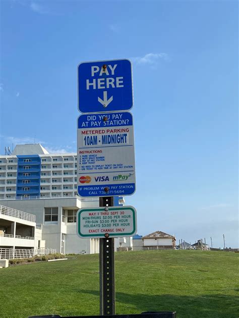 Long branch beach parking.  Please check signs and use pay View an image...