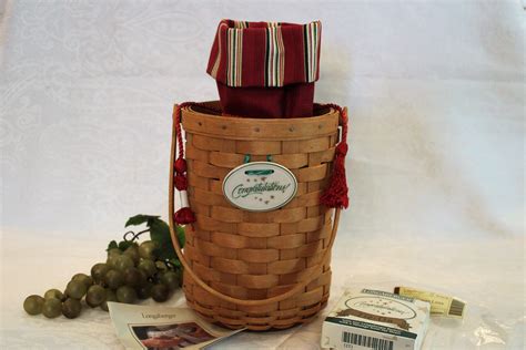 Longaberger wine basket. Longaberger is an American home and collectibles brand known for artisanal handcrafted and home décor products manufactured handmade maplewood baskets in Dresden, OH. Home décor, kitchen, and lifestyle products made in America and abroad. Founded by Dave Longaberger in 1973. 