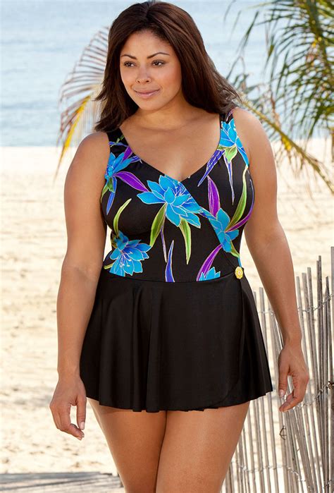 Longitude offers plus sizes for many of their skirted bathing suits or swim dresses. Empire and princess styles of tall and plus-size swim dresses have a fitted bust with a built-in bra for support and an A-line or princess skirt that flows from under the bust..