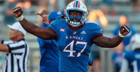 Lonnie Phelps Jr.'s stay with Kansas football won't last for more than a season, as the star defensive end announced Thursday he's declaring for the 2023 NFL Draft. Phelps joined the Jayhawks as a redshirt junior for the 2022 season, and rose quickly to become their leading pass rusher.