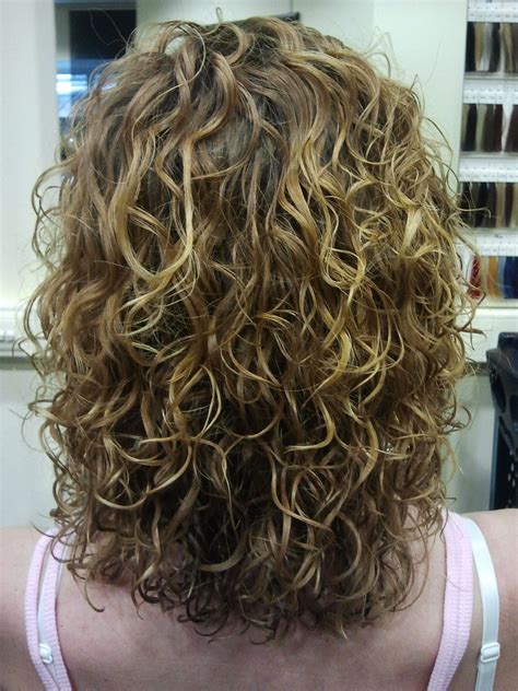 Spiral perms work with any hair length, as long as you have enough hair to work with (AKA, wrap onto perm rods). These waist-length spirals prove a perm looks fresh on …. 