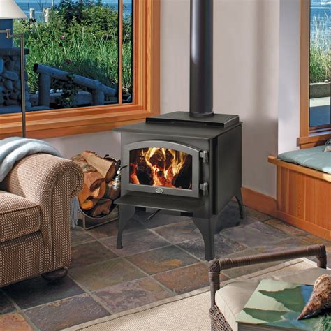 Lopi wood stove. Cypress™ Bay Window. The Cypress™ Gas Stove offers a unique and timeless presentation of fire, with clean lines and sleek styling. This stove features an open, three-sided design with a large wrap-around ceramic glass fireviewing area, allowing you to enjoy the beauty of the award-winning Ember-Fyre ® log set from any angle in the room. 