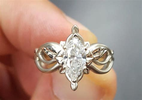 Lord of the rings engagement ring. A place to post about engagement rings. Feel free to discuss past or future purchases, learn about gems, cuts, and settings, and of course show off your engagement rings! NEW! Looking for design help or a custom ring quote? Come see us at r/engagementringdesigns! 