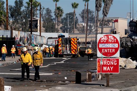 Los Angeles drivers urged to take public transport after massive fire closes interstate