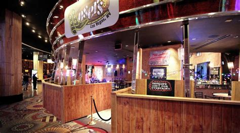 Losers bar. Losers Bar & Grill offers a variety of appetizers, salads, sandwiches, burgers, pizza, pasta, and desserts. Enjoy live music, karaoke, and sports on their TVs while you … 