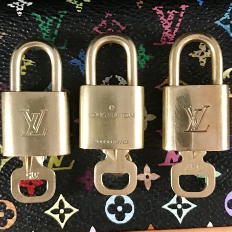 Louis vuitton lock and key authentic. Authentic Louis Vuitton padlocks with matching keys o… 