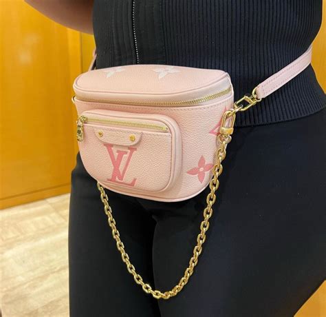 Louis vuitton mini bum bag. Coming in at 6.7 X 4.7 X 3.5 inches in size, it is a much smaller take on the original bumbag. Available in the iconic monogram, as well as the popular Empreinte leather, there is a style for every LV lover. Priced at $2,030 the cost is notably higher than its predecessor. Louis Vuitton Monogram Mini Bum Bag. 