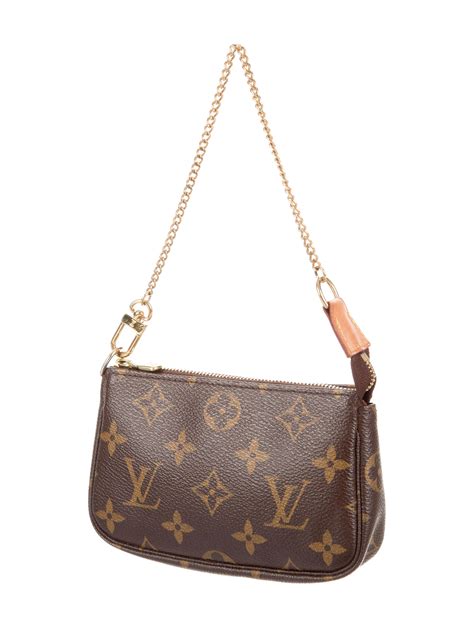 Louis vuitton small chain purse. Pochette Félicie Bag. £1,060.00. The stylish mini bags by Louis Vuitton stand out as true gems, offering a wide range of exquisite accessories. These luxury creations have … 