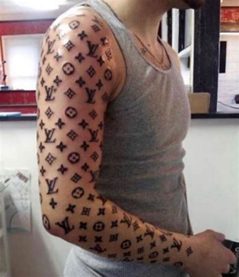 Louis vuitton tattoo. Jan 15, 2024 · Jan 15, 2024. COMMENT. Christian Liewig - Corbis / Getty Images. In the latest edition of WTF, a man got his face covered in Louis Vuitton tattoos. It appears that the man was tattooed by... 
