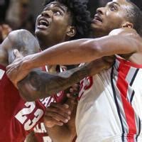 Louisville cashes in at the line, defeats New Mexico State 90-84 in overtime