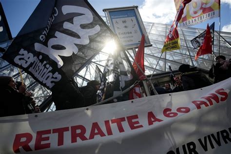 Louvre workers block entrance as part of pension protest