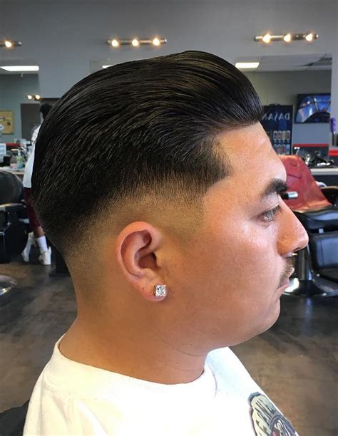 Slicked Back Disconnected Undercut. For a more polish