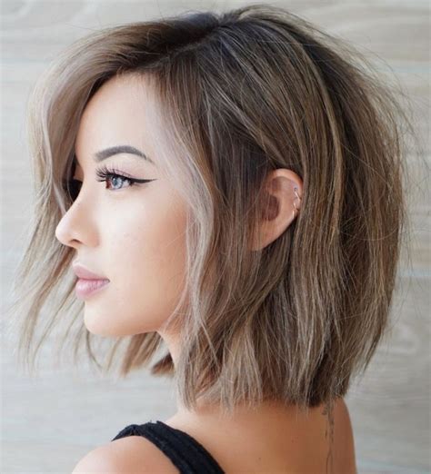 Low maintenance medium length hairstyles for fine hair. A thin, pink, and tousled lob is a great hairstyle. Adding a long bob can give you more length and body if your hair is thin. The ideal length for a long bob is around the shoulders and collarbones. Layers on top can add height while keeping fullness at the sides. Instagram @eastonhair. 
