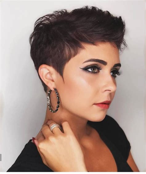 6. Messy Pixie With Long Bangs. Short haircuts can be great low maintenance options, though regular trims are a must to keep a pixie from morphing into a longer bixie (pixie/bob) cut. Go for extra length on top that won’t show new growth as quickly, leaving the bangs long with tapered length down the back and sides.. 
