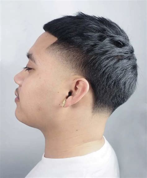 In a bald fade, the top is very short and fades only slightly on the sides and at the back. This cut works very well with kinky hair when you're considering a taper vs fade cut. Skin Fade. Whereas other fade styles like the low and high fade's names refer to where the fade is executed, 'skin' fade refers to how it's done.. 