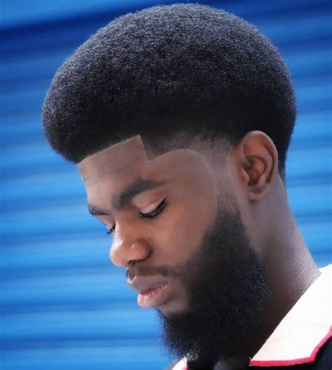1. Low Afro Taper Fade source A flat top is the scene stealer for this low taper faded afro. It has plenty of shapes and none of the maintenance. 2. Mini Afro + Taper Fade source If you're all about a haircut that's simple but still like your style, try a mini afro with a taper fade. The fade is the only part you'll have to touch up. 3.. 