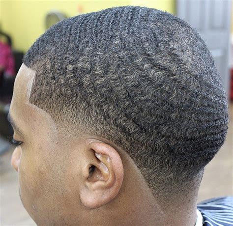 Low temp fade waves. Feb 20, 2024 · Step 2 – Style. Visit your barber regularly to keep your hair well-trimmed. You must also use suitable styling agents, such as pomades and gels, to hold your hair in place. Look up black men with straight hair and learn a few tricks. 