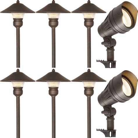 Low voltage outdoor landscape lighting. Low-voltage cables (left) must be buried at least 6 inches deep. A plastic spike (center) anchors the fixture (right) in the ground. Similar to shown: Frosted Globe walk light by Malibu with 11-watt bulb, about $20; Total LED Malibu Lighting. Landscape Lighting Design Ideas Fetching Facade 