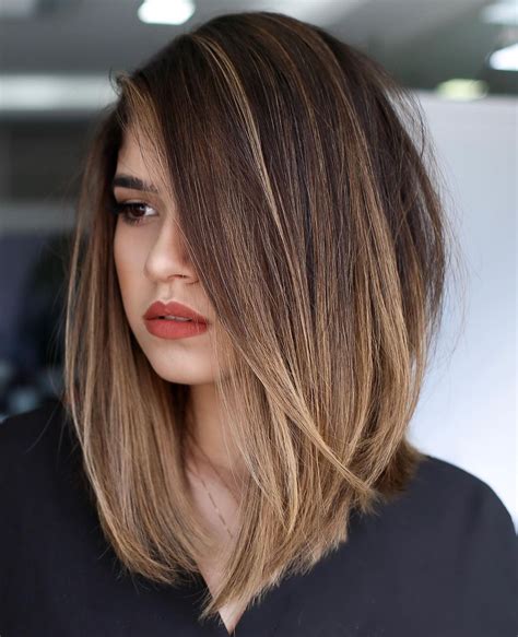This medium length hairstyle is low-maintenance and often worn by A-list actors between roles. Ask your barber to trim your ends but leave 5-6″ of length, then push the hair back and allow it to ...
