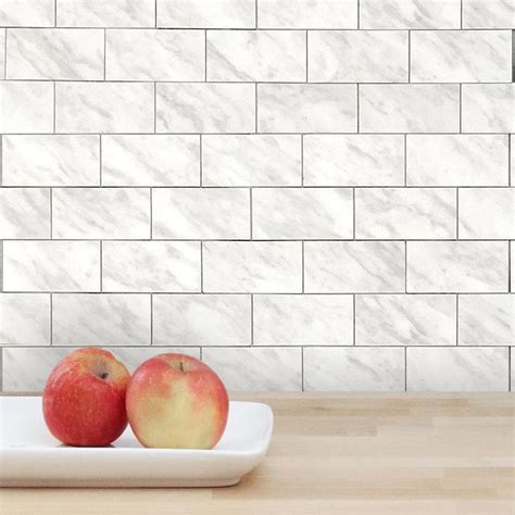 Apollo TileGray and Silver 12-in x 12-in Brushed PVC Hexagon Peel and Stick Tile (20-sq. ft/ Carton) Model # TCPLST9908. 1. Color: Gray and Silver. • Weights and dimensions: mosaic sheet-12 W x 12 L inches, thickness 0.2 in/5.08 mm Sq ft per sheet 1, sheets per box- 10 Sq ft per box 10 inches. • Recommended use: kitchen backsplash, bathroom ... 