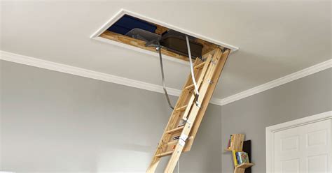 Mark the holes on each side, drill ‘em out, and attach the feet with the provided bolts and lock nuts. Extend the ladder fully, and drill for the feet. The foot gets attached with a bolt and lock-nut. To finish your project, get some spray foam and insulate the gap between the joists and the ladder frame.. 