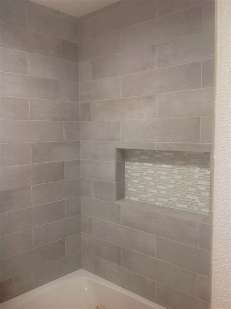 Tile: Form Meets Function. Tile has been used in wet spaces since the days of the Roman Baths. Durable, waterproof and resistant to mold, germs and bacteria, glazed tile, like ceramic and porcelain, encaustic tile, like cement, and natural stone tile are all beautiful choices for bathroom flooring, walls and shower surrounds.. 