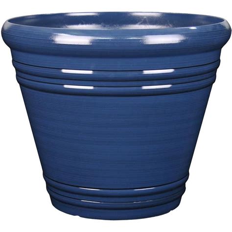 5.3-in W x 4.7-in H Copper Green Glaze Ceramic Contemporary/Modern Indoor/Outdoor Planter. Shop the Collection. Model # 1699 IRGN. Find My Store. for pricing and availability. Material: Ceramic. Container Size: Small (0-8 quarts) Shape: Round. Use Location: Indoor/Outdoor.. 