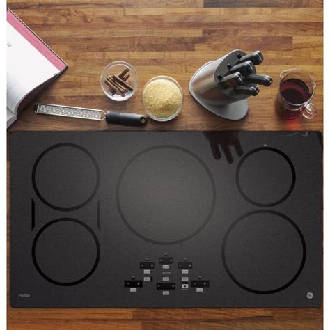 VEVOR20 x 11.6 x 2.8-IN 3000W 240V 20-in 2 Burners Smooth Surface (Radiant) Black Electric Cooktop. 1. • Electric Stove Top 20-In, it is suitable for 220-240V, featuring 2 independent cooking zones with a total power of 3000W. • It has 9 heating power levels; With a temperature control and the timer function.. 