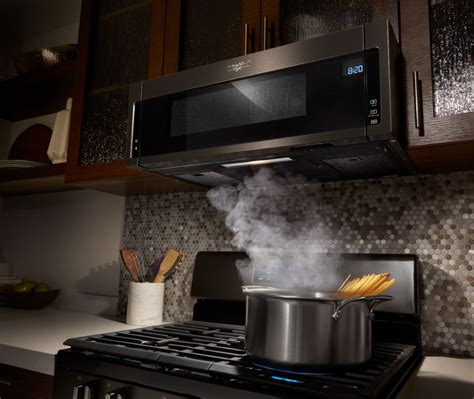 Find a better fit for your kitchen with this small over-the-range microwave with vent that removes smoke, odor and moisture like a standard hood. Save space with a low profile design that fits in the same space as your undercabinet hood but can still cook all the essentials with 1.1 cubic feet of purposeful capacity and 1,000-wattcooking power.. 