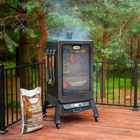 To use a pellet grill or pellet smoker grill, start by pouring the cooking pellets into the storage container, known as a hopper, mounted on the grill. An electric motor powers an auger that moves the pellets from the hopper to the firebox. An ignition device lights the pellets, creating the combustion that cooks the food in the cook chamber.. Lowes smoker pellets