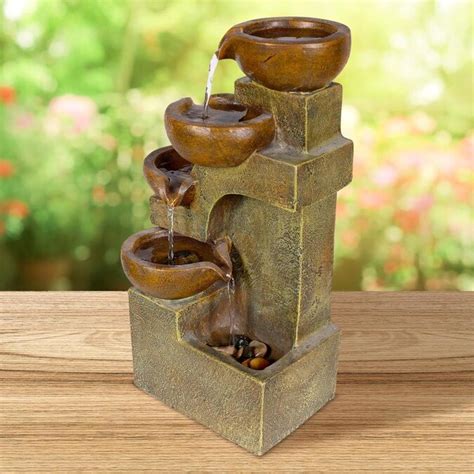 Shop Alpine Corporation 14-in H Resin Tiered Outdoor Fountain Pump Included in the Outdoor Fountains department at Lowe's.com. Relax and enjoy the sounds of nature with the Alpine Corporation 14 in Tall Indoor Stone Look Oval Shaped Waterfall Fountain! ... This side-tiering oval-shaped cascading waterfall fountain tabletop statue with 1.7L ...