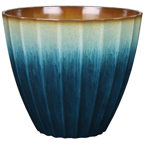 5.3-in W x 4.7-in H Copper Green Glaze Ceramic Contemporary/Modern Indoor/Outdoor Planter. Shop the Collection. Model # 1699 IRGN. Find My Store. for pricing and availability. 153. Material: Ceramic. Container Size: Small (0-8 quarts) Shape: Round..