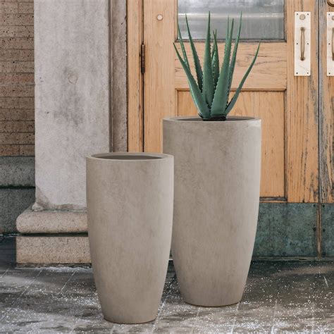 KANTE 2-Pack 17.3-in W x 31.4-in H Weathered Concrete Contemporary/Modern Indoor/Outdoor Planter. These elegant tall planters have authentic concrete finish with visible pores making them beautiful contemporary pieces. The look and feel is true concrete but it weighs substantially less than it looks and makes it easier to move around.. Lowes tall planter pots