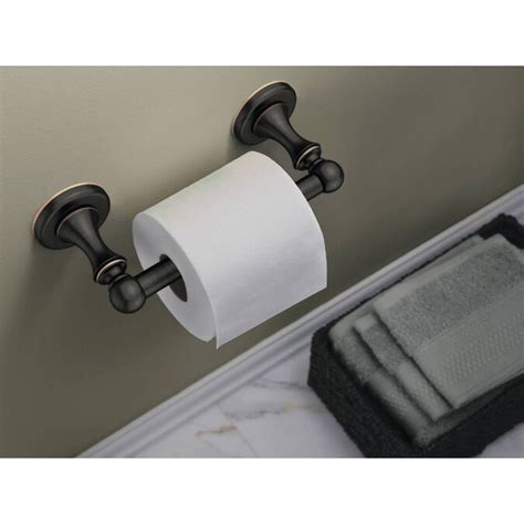 DIMENSIONS: Toilet paper holder measures 2.46-in H x 7.72-in L and 3.63-in D. EASY INSTALL: All mounting hardware, template, and instructions provided. COORDINATE: Complete your look with the coordinating Esato Bath Collection of accessories (sold separately) WARRANTY: Enjoy the look you love for life with Delta’s Limited Lifetime …. 