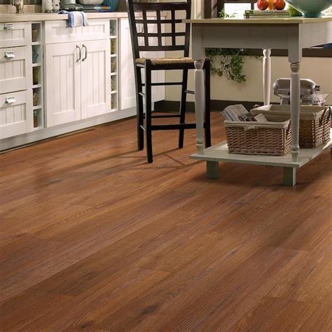  PergoTimberCraft + WetProtect Hillcrest Hickory 12-mm T x 7-1/2-in W x 47-1/4-in L Waterproof Wood Plank Laminate Flooring. Model # LF000906. 1312. • This laminated wood flooring features elegant red tones, a rich, hand-scraped surface, and multi-width planks for a refined, rustic look. . 