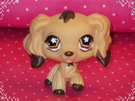 This item: GreenPets lps Toy Dog lps Cocker Sapniel 748,lps Pet Yellow Body Blue Eyes lps Cocker Spaniel with lps accesory Scraf Glasses Ginggerbread Man Kids Gift $185 + …. 