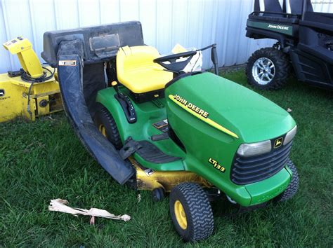 The John Deere LT133 is equipped with manual steering, an open operator station and 7.5 liters (2 US gal.; 1.6 Imp. gal) fuel tank. Following attachments are available for John Deere LT133 lawn tractor: John Deere 38 mid-mount 38 in (960 mm) mower deck with two-blades and manual lift; John Deere 4291M front-mount 42 in (1,060 mm) blade. 