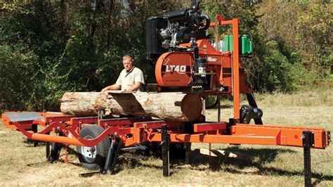 For sale is a very nice Woodmizer lt40 Super hydraulic sawmill with a low 890 hours on it. This machine is powered by the 4 cylinder Wisconsin 35 hp engine. It starts runs and cuts good. It will cut a log 21ft 2 inches long and 36 inches in diameter. This machine has the hydraulic log loader, hydraulic log turner, hydraulic log clamp, and ...