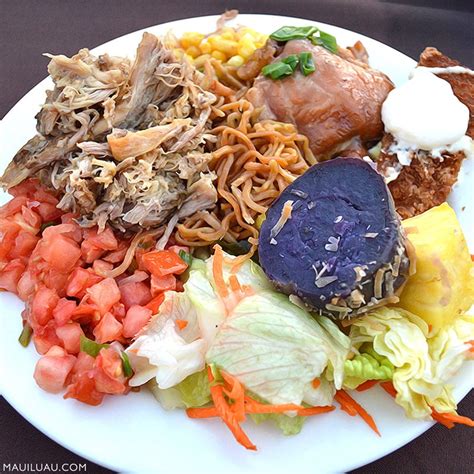 At a luau, guests are served a plate with an assortment