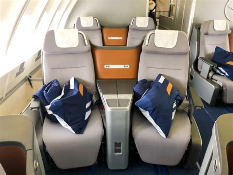 Lufthansa 747 business class. Some 13 747-8 routes Unlike the 747-400, the 747-8 variant is much heavier, with a greater MTOW and payload. Yet with 364 seats, Lufthansa's -8s have less capacity than the older series. This is, of course, because its -8s are much more premium. They have eight first class seats, 80 in business, 32 in premium … 