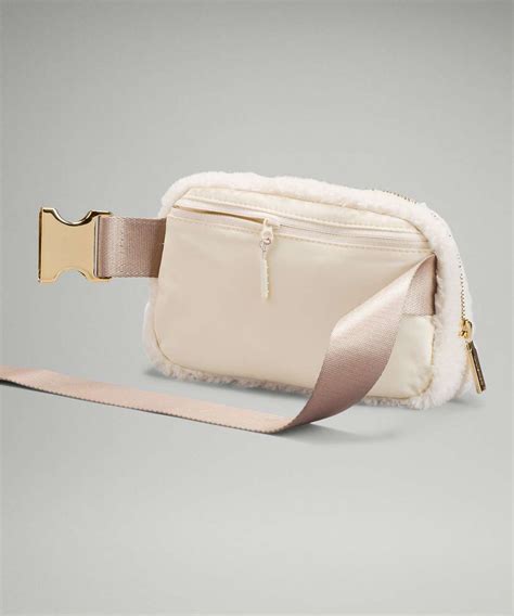 Lululemon fleece belt bag ivory. If, for some reason, you're not a fan of fleece material (which can only be spot-cleaned), you can still join the lululemon belt bag army by purchasing the brand's original polyester version, which is sleek, smooth and water-resistant to boot. (Plus, it rings in at a lower price—$38, to be exact.) And the color options? Endless. 