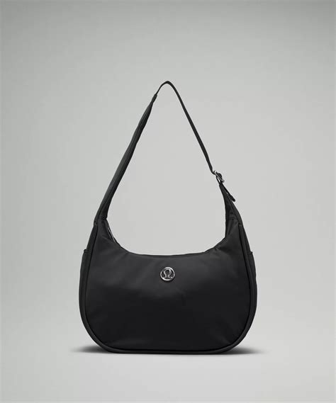 Lululemon mini shoulder bag 4l. Mini Shoulder Bag: https://shop.lululemon.com/en-ca/p/bags/Mini-Shoulder-Bag-4L/_/prod11570141?color=0001True Identity Card Case: https://shop.lululemon.com/... 