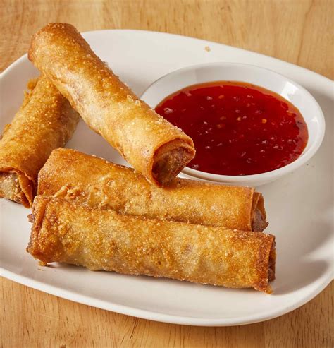 To cook frozen lumpia, simply deep fry them in oil heated to 350 F until golden brown, about 2-3 minutes. You can also bake them in the oven at 400 F for 10-12 minutes if you prefer not to deep fry. Reheat any leftovers in the microwave.
