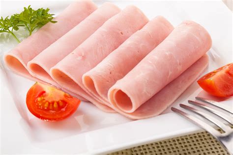 Lunch meat ham. The preservative sodium nitrite fights harmful bacteria in ham, salami and other processed and cured meats and also lends them their pink coloration. However, under certain conditions in the human ... 