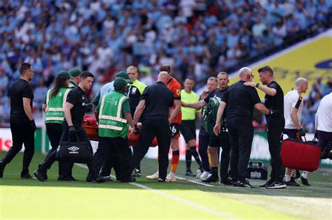 Luton captain Tom Lockyer conscious in hospital after collapsing during playoff final