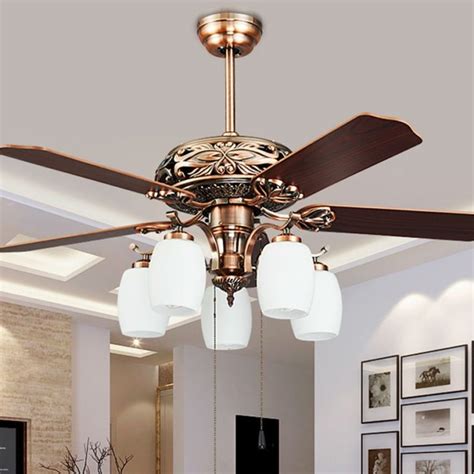 Luxury ceiling fans. ENTICER ES. 1200 mm Rosewood. FHCEN2SRWD48. Exotic rich looks with modern styling. 225 m³/min Air Delivery, 350 revolution per minute. Color : Rosewood. MRP Rs.:₹ 6740.00 (incl. of all taxes) View Detail. 